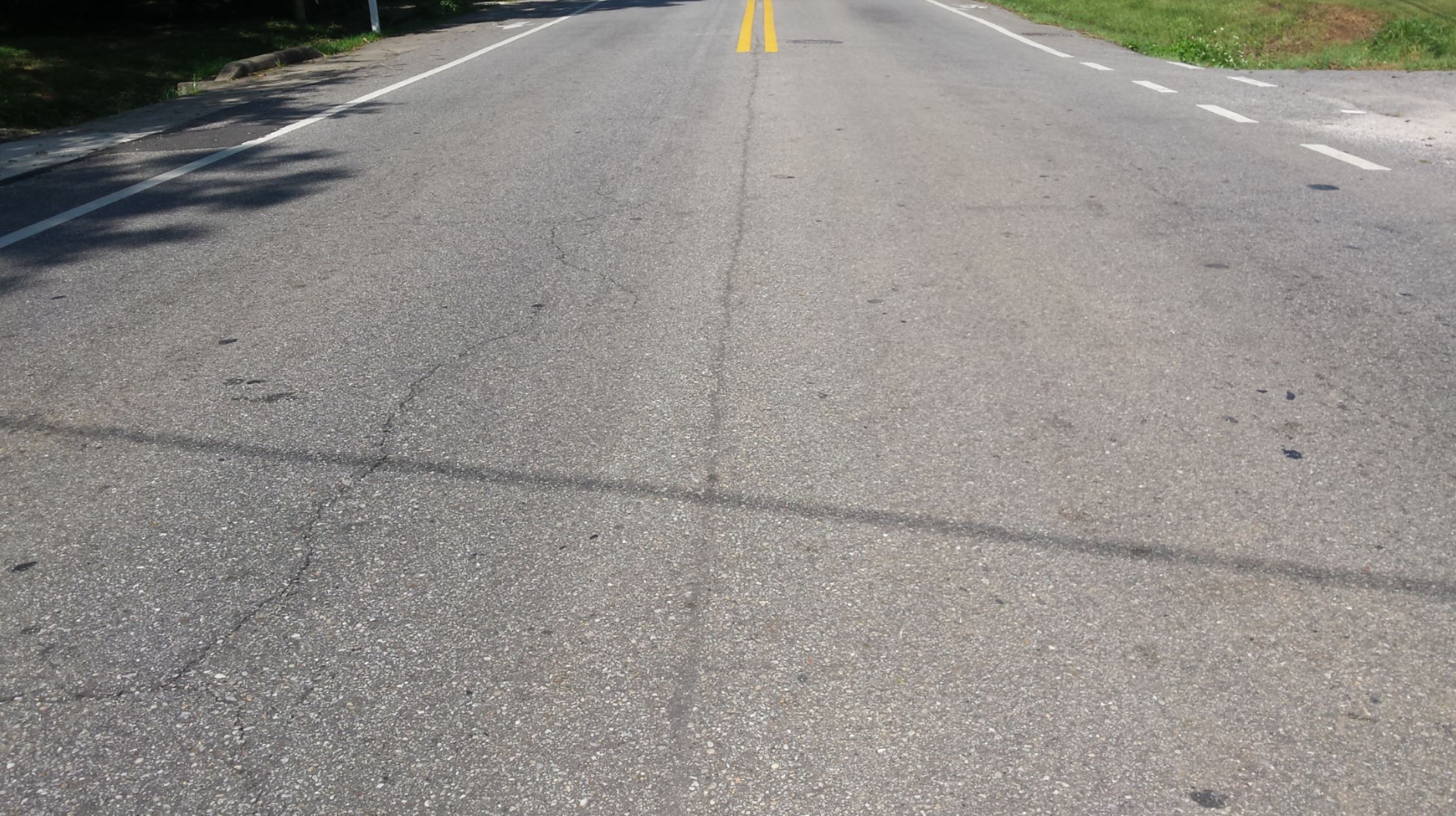 Asphault road with as evidence of a hard path.